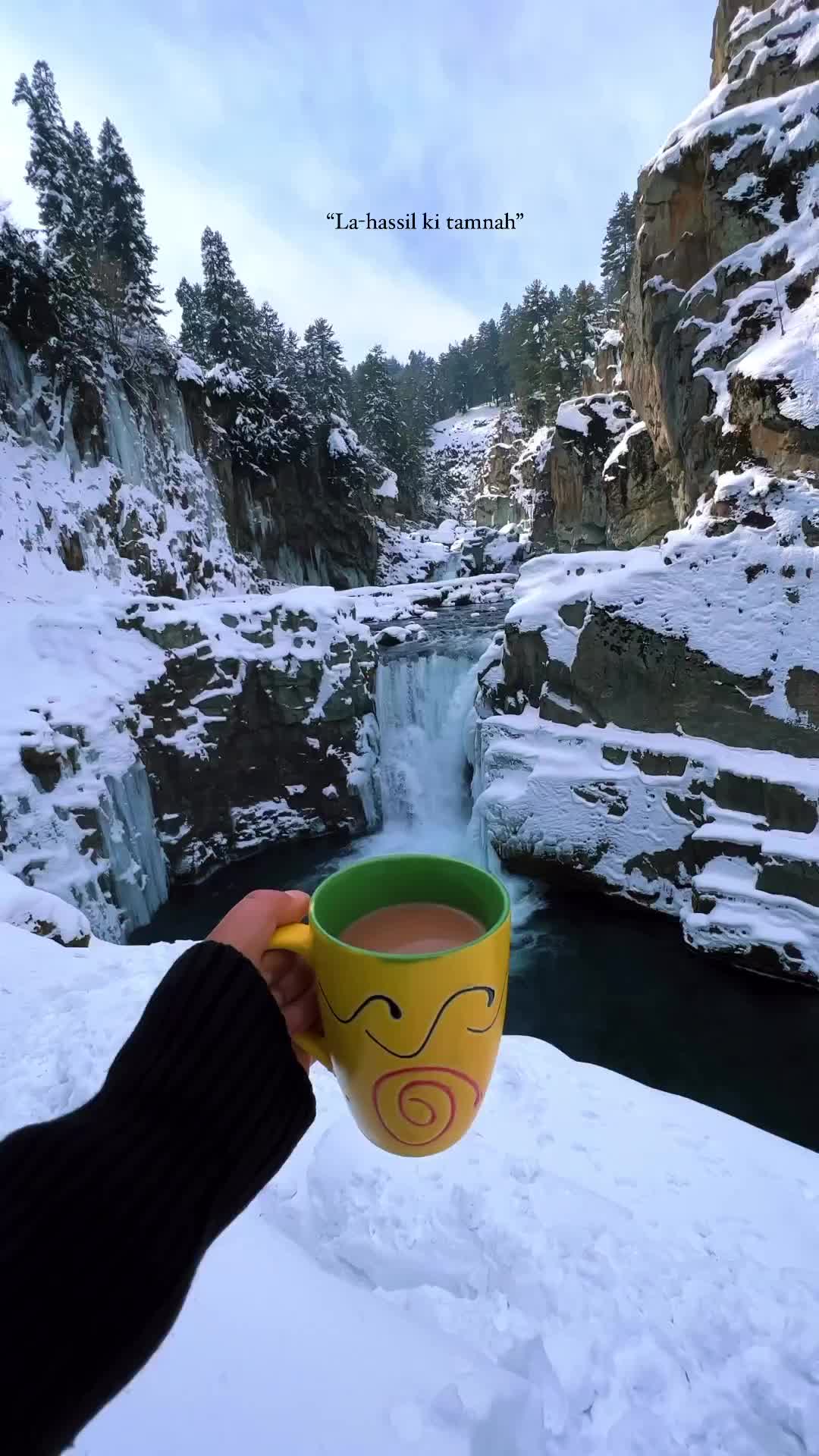 Sip Tea Amidst Aharbal Waterfall's Winter Beauty