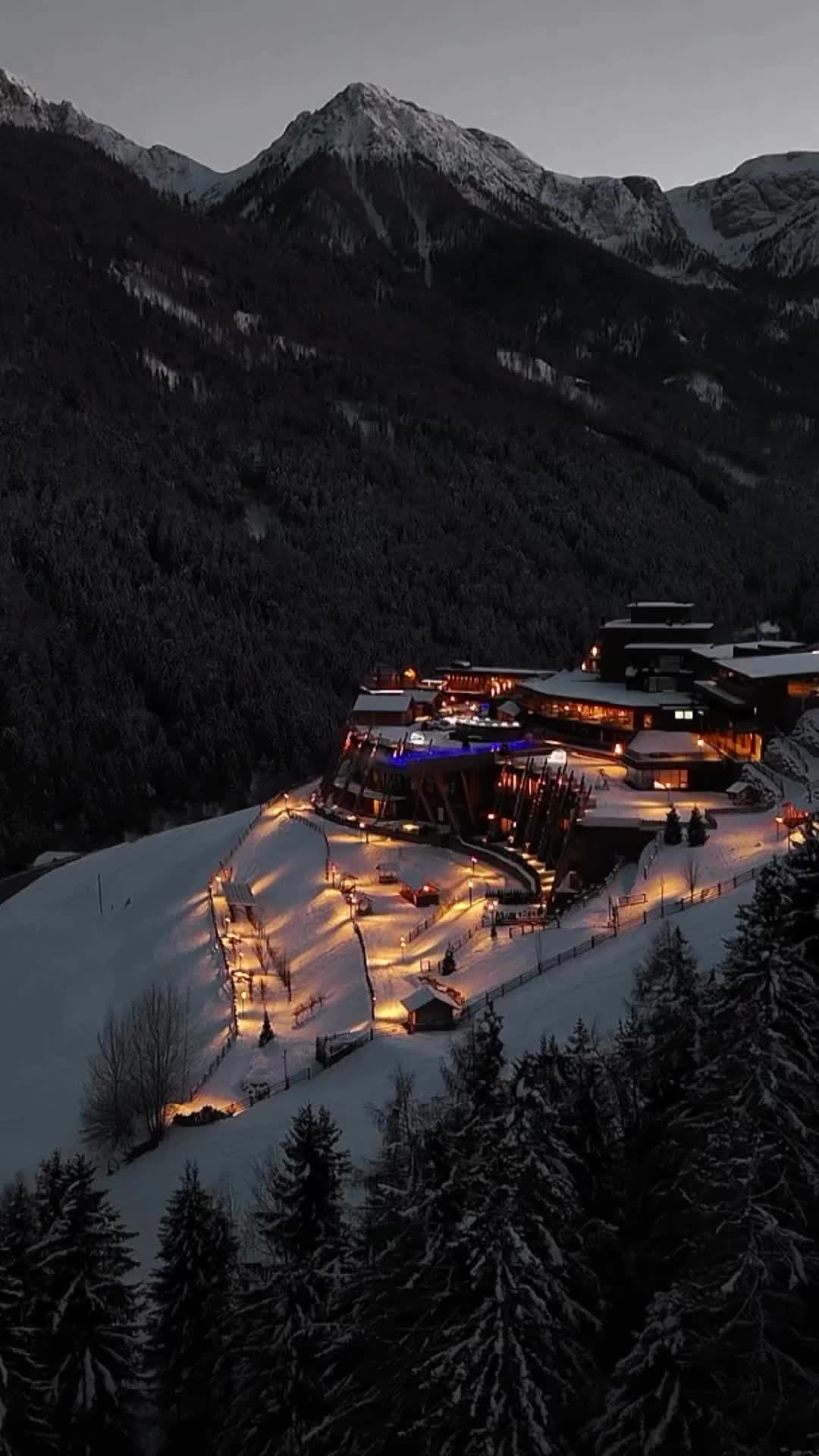 Luxury Winter Hotel in Italian Mountains at Night