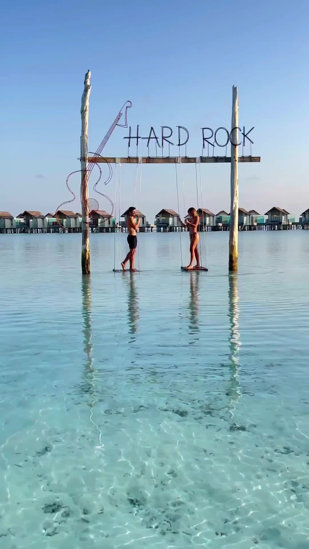 Swinging Over the Blue Waters at Hard Rock Maldives