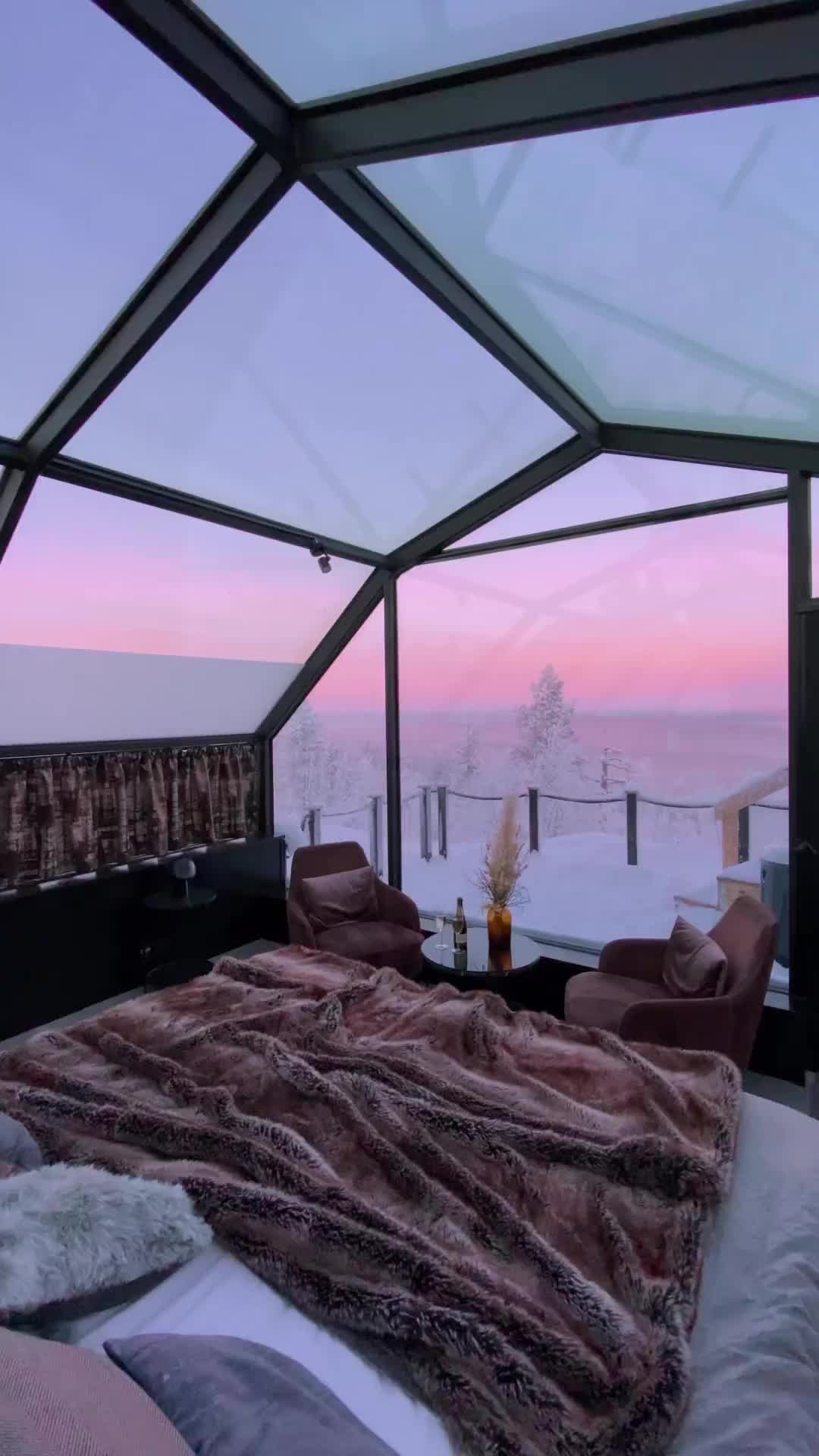 Experience Northern Lights in a Glass Igloo in Finland