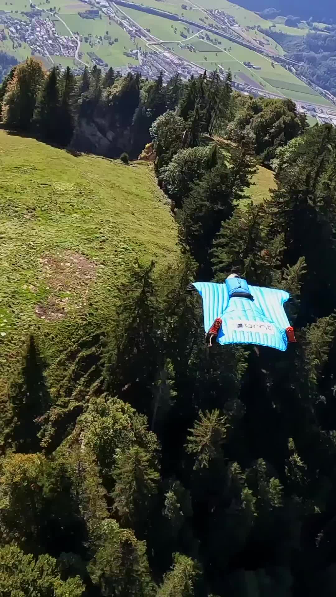 Wingsuit Flight Through The Crack in Walenstadt, Switzerland