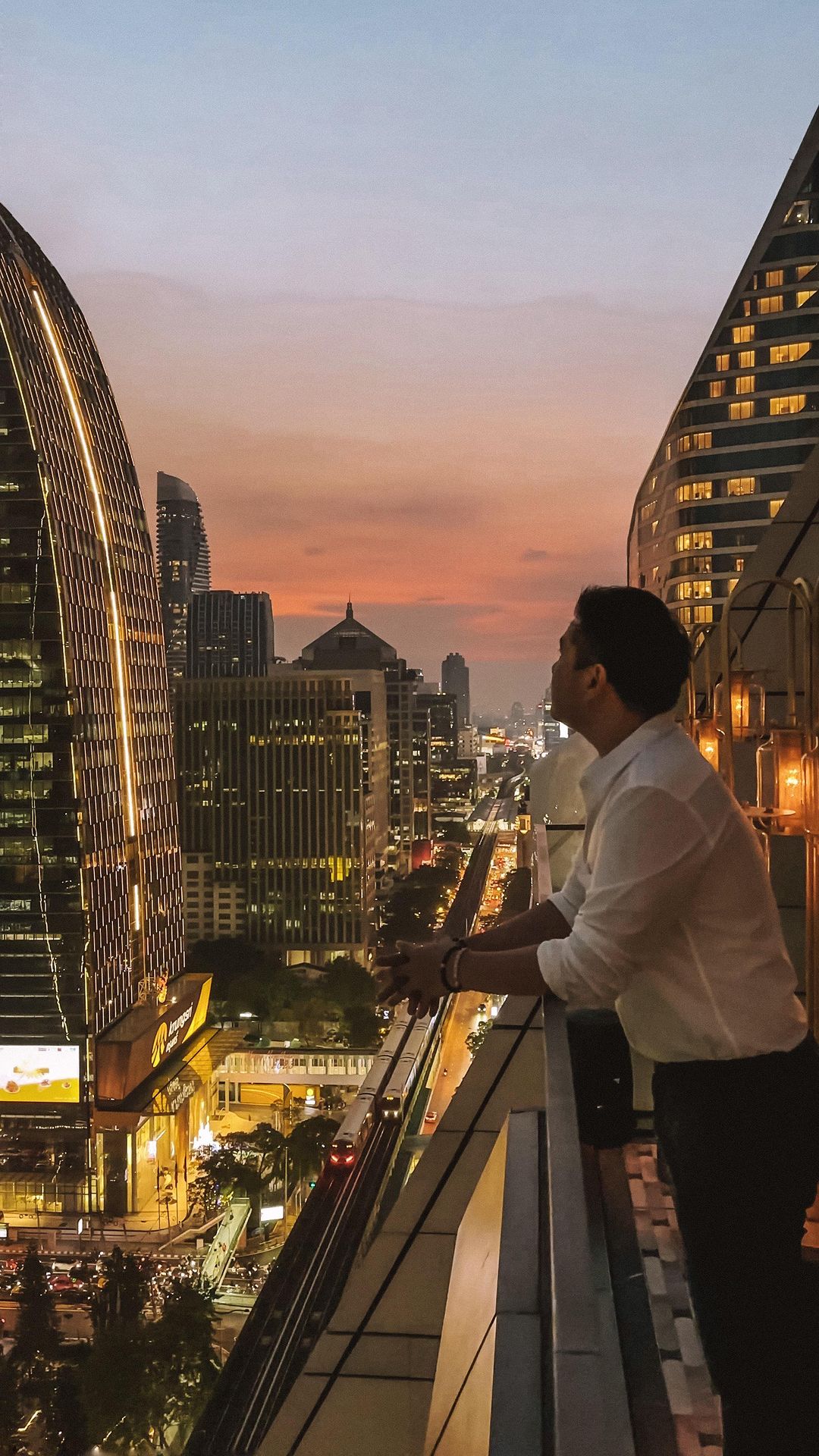 Bangkok, the city of magic and wonder.✨

The view of sunset is truly spectacular at @rosewoodbangkok . The city lights glisten on the horizon and the sky is a brilliant pink, orange and yellow. It’s really magical up here, isn’t it? 

📍 @rosewoodbangkok | @nanbei.bkk 
.
.
.
.
.
.
.
.
.
.
.
.
.
.
.
.
#Rosewood #RosewoodBangkok #RosewoodHotels #Nanbei #thailanddestiny #lostinthailand  #thailandonly #thailandinstagram #thailand_allshots 
#visitthailand #igthailand #travelthailand #thailand🇹🇭 #beautifulthailand #thailandtravel #bangkokthailand #explorebangkok #bangkoklife #visitbangkok #bangkokcity  #bangkok #bkk #bkklife #hotel #hoteldesign #hotellife #luxuryhotel #luxurylifestyle #hotellife #hoteldesign