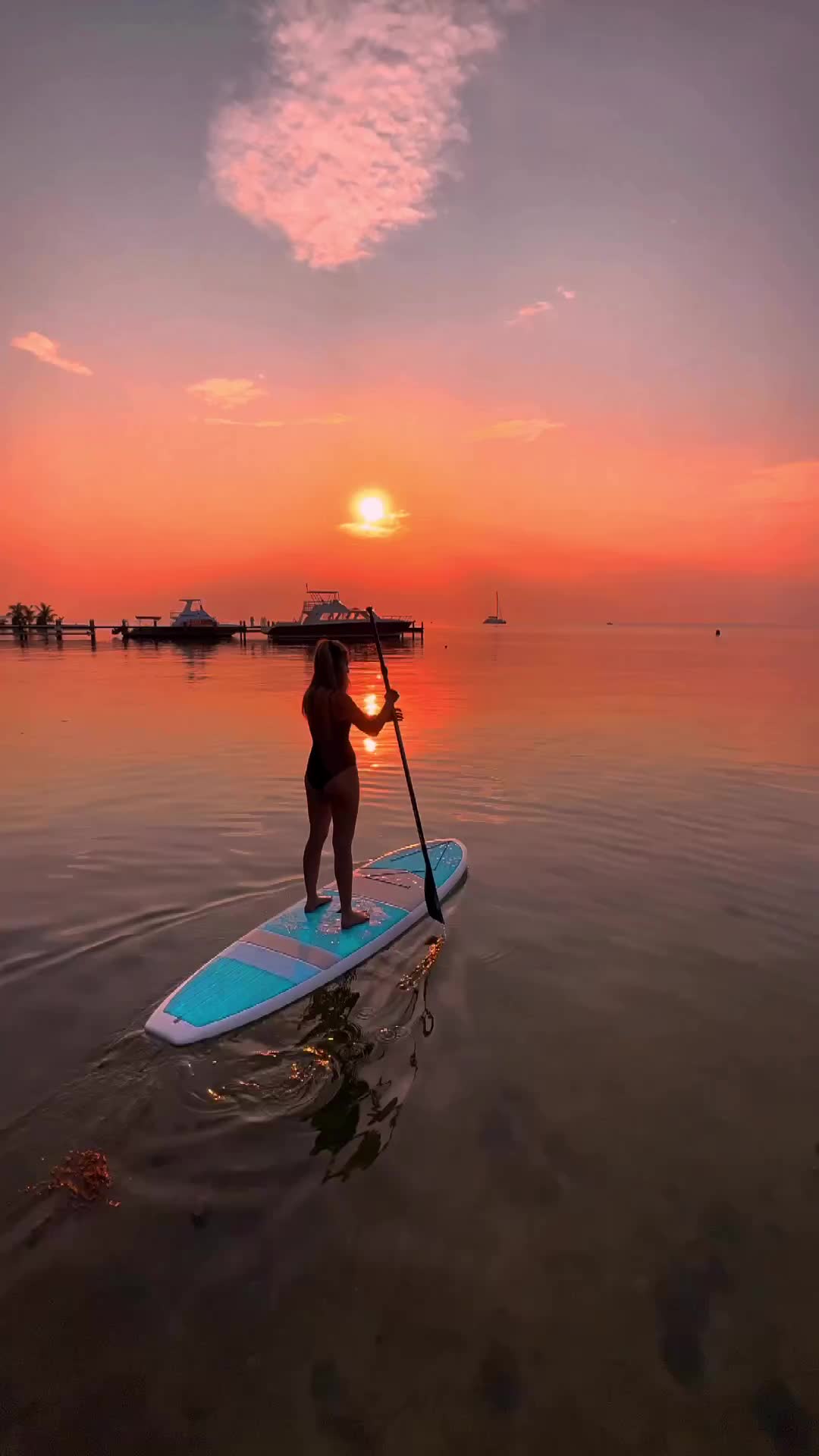 Paddle Boarding at Sunset in Belize's Good Living Camp