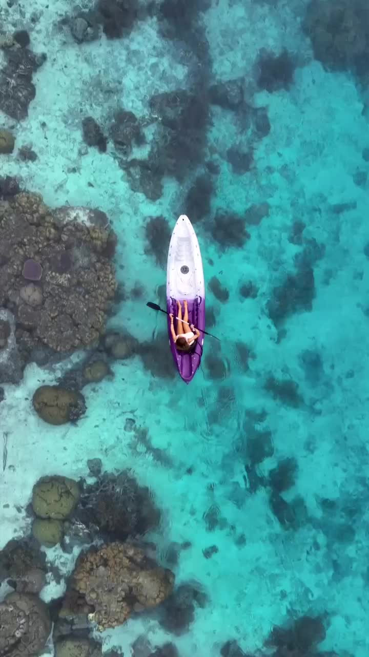 Kayaking in Clear Blue Waters of Raja Ampat, Indonesia