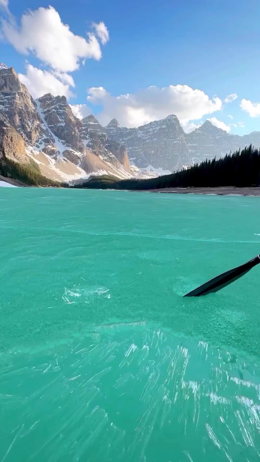 Canoeing Through Candle Ice in Banff National Park