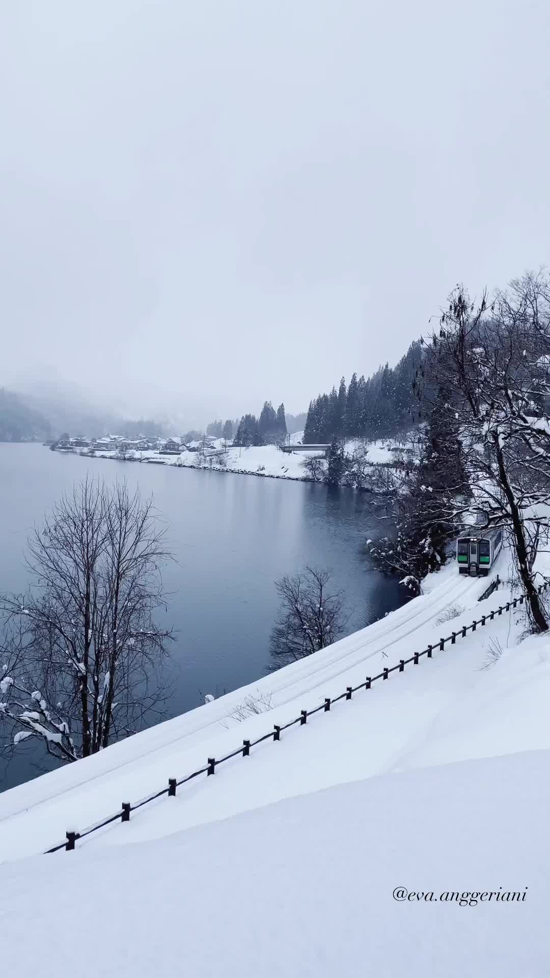 Stunning Winter Train Over Tadami River in Fukushima