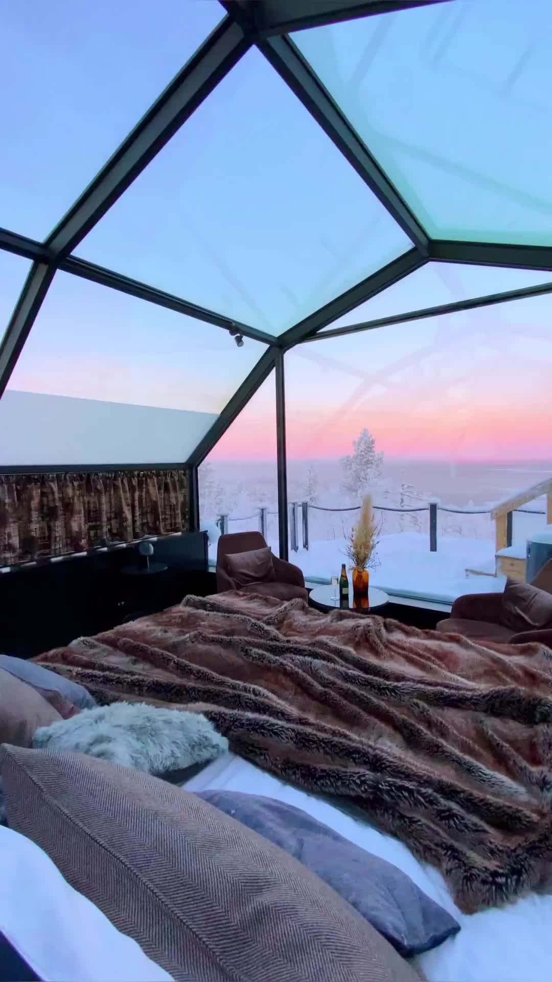 Experience Northern Lights in a Glass Igloo in Finland