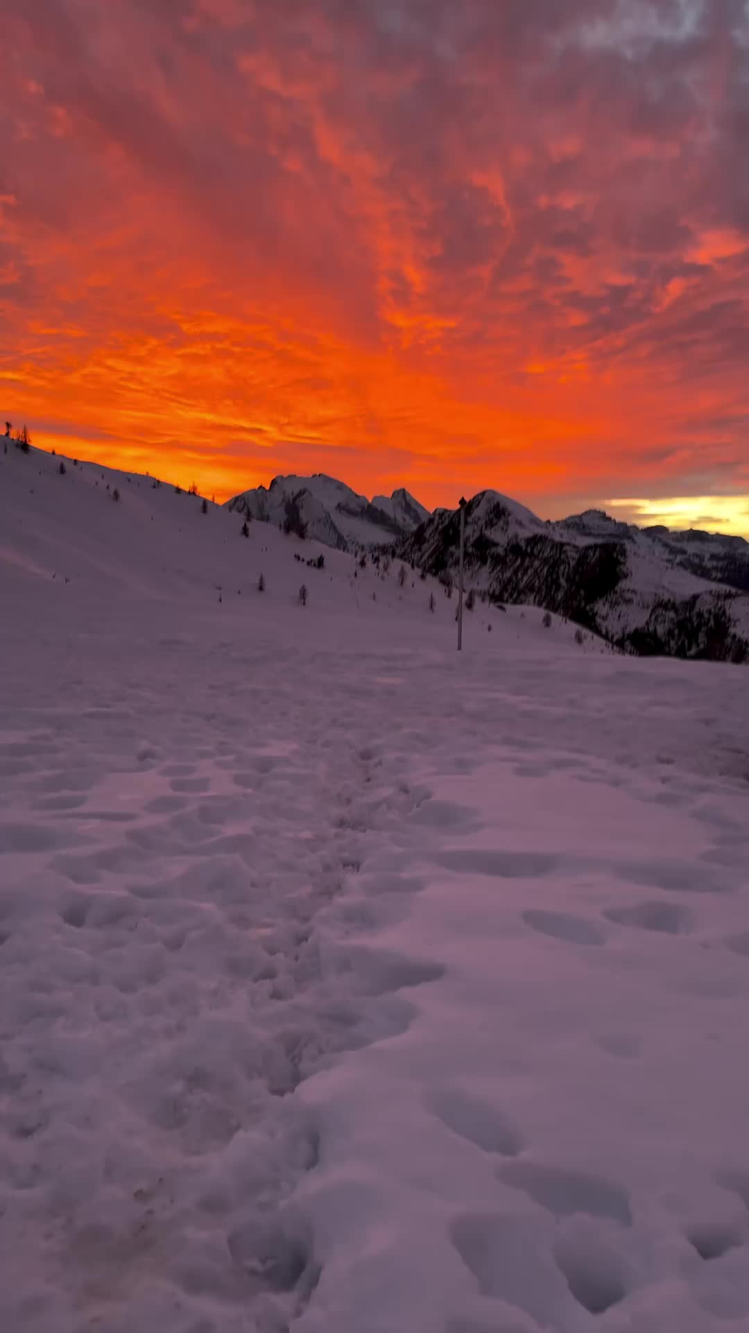 Sunset Over Snowy Dolomites in Italy