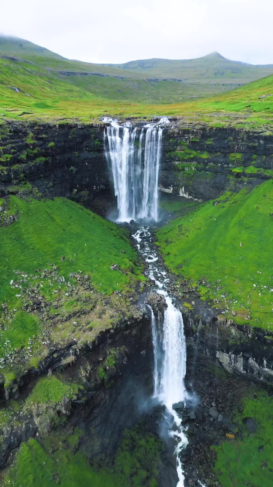 Stunning Roadside Waterfall in Faroe Islands