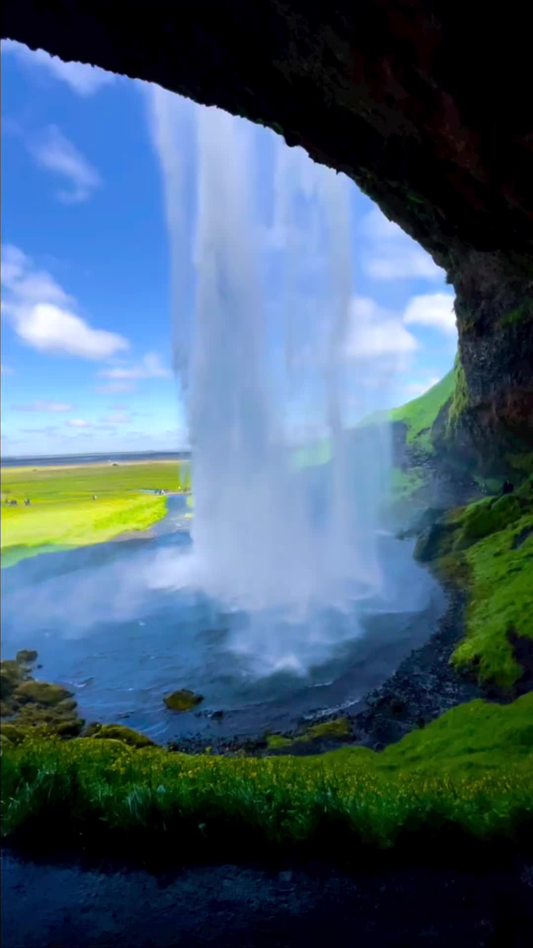 Walk Behind Seljalandsfoss Waterfall in Iceland