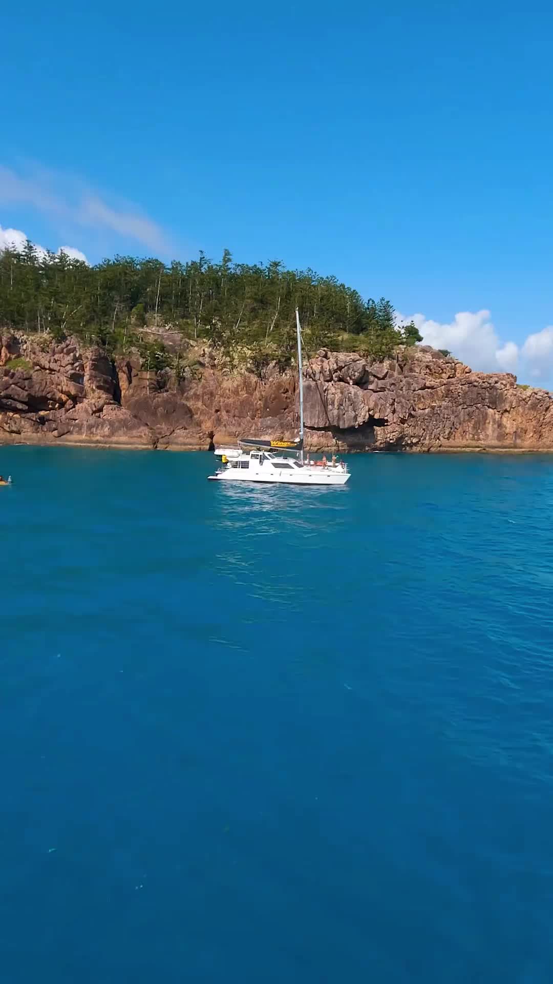 Epic Cliff Jump in the Whitsundays - Timing is Everything